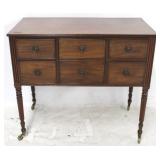 English 6 drawer chest on tall turned legs