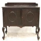 Carved Chippendale 2 door server on tall leg