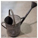 Galvanized watering can