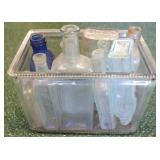 Glass bin with 11 bottles