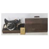 Singer sewing machine in wood case