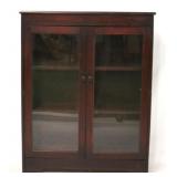 Double door mahogany glass front bookcase