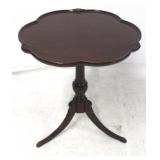 Carved mahogany side table