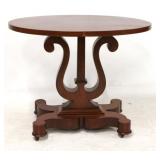 Oval Empire parlor table with harp base