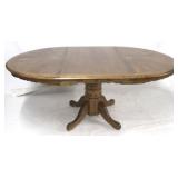Oak pedestal dining table with leaf
