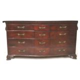 Mahogany pagoda style carved triple dresser