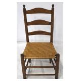 Ladder back woven seat chair