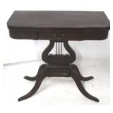 Mahogany lyre pedestal game table