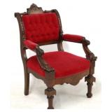 Walnut Victorian carved & tufted back arm chair