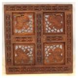 Carved wood wall hanging