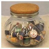 Glass jar w/ assorted sewing items