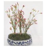 Planter with faux flower