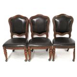 3 Chairs with nail head trim on rollers