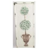 Metal wall plaque of topiary
