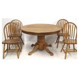 Round oak pedestal table w/ 4 chairs