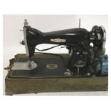 Vintage Remington De Luxe sewing machine in case