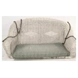 Wicker porch swing