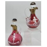 Pair Bohemian Mary Gregory cranberry cruets