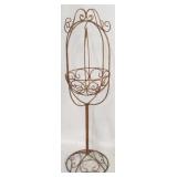 Metal swinging planter on stand