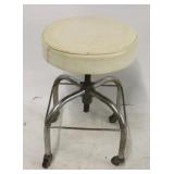 Vintage adjustable rolling stool