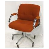 Steelcase chrome swivel chair in orange
