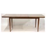 Tapered leg dining table with pop up leaf