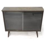 Mid century sliding glass door bookcase