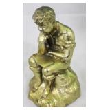 Brass boy statue
