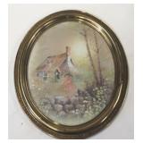 Oval framed print