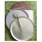 Lot of assorted pizza pans w/ cutter