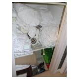 Bottom 2 shelves linen closet