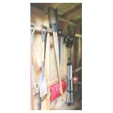 Shed wall of assorted yard tools