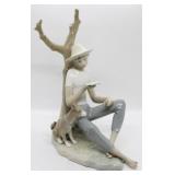 Llardo figurine reading boy w/ dog sitting at tree