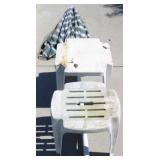 Pair of plastic tables & umbrella