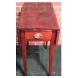 Drop side one drawer stand