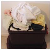 Plastic Tote Full of Assorted Linens
