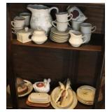 Group stoneware in cabinet