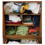 Group linens in cabinet