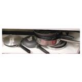 Shelf lot of assorted cookware to include waffle