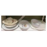 Shelf lot of assorted dishes
