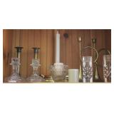 Shelf of candle holders