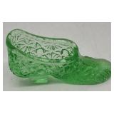 Small green glass shoe