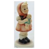 Hummel girl with doll - 3"