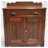 Victorian carved 2 door washstand w/backsplash