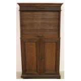 Original finish vintage oak roll front cabinet