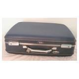American Tourister Tiara suitcase with dent