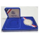 U S Liberty one dollar Ellis Island coin