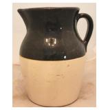 Brown & white stoneware pitcher - 10"