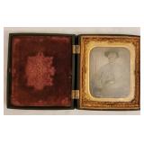 Small daguerreotype of uniformed man in frame