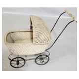 Vintage wicker doll stroller